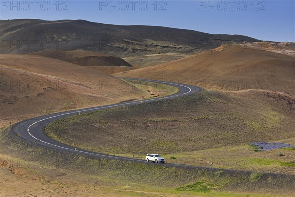 White car driving the Route 1