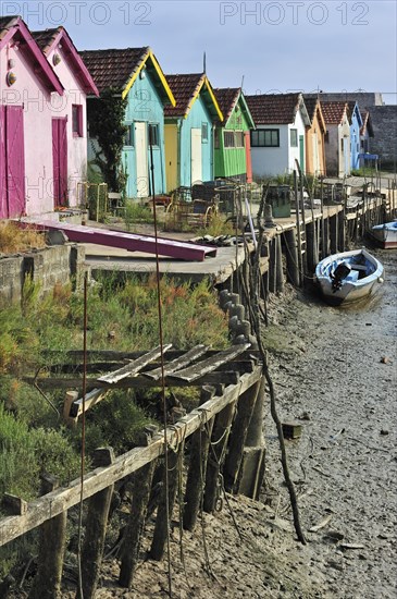 Colourful cabins of oyster farmers in the harbour at Le Chateau-d'Oleron on the island Ile d'Oleron