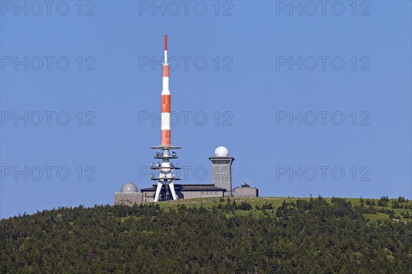 Old transmission tower and new television tower