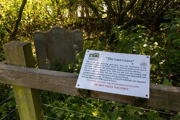 The Last Grave of All Saints church sign in woods on the cliff