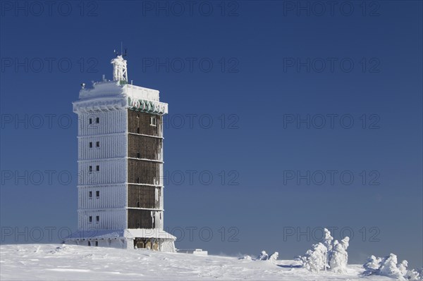 The Brocken weather station on the Brocken in the snow in winter