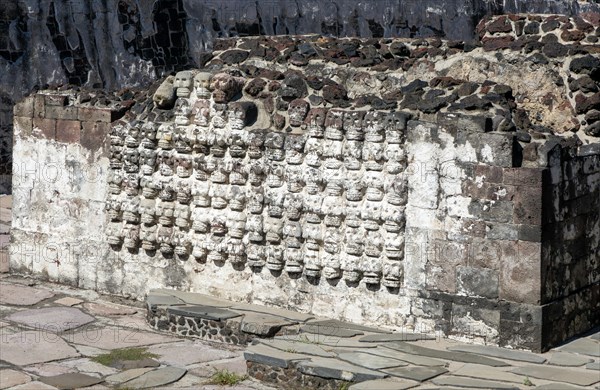 Wall of stone skulls called Tzompantli