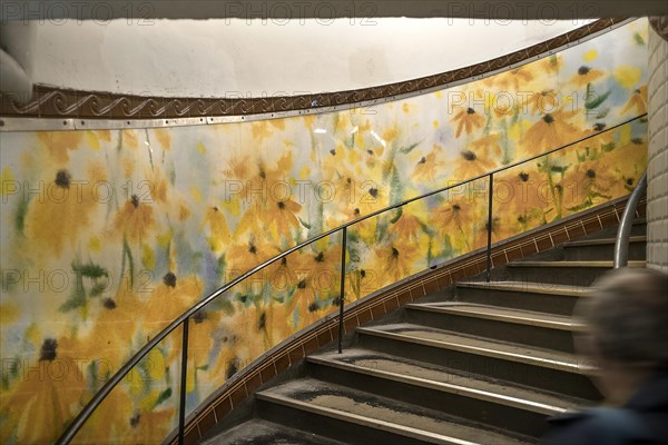 Staircase in the Metro station Abbesses designed with a watercolour of flowers