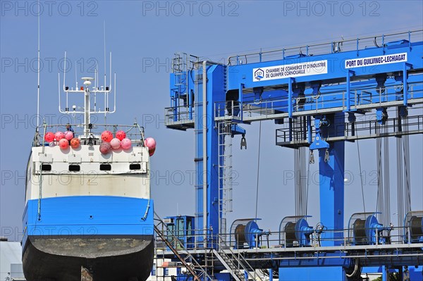 Trawler fishing boat on shipbuilding yard for maintenance works in the Guilvinec port