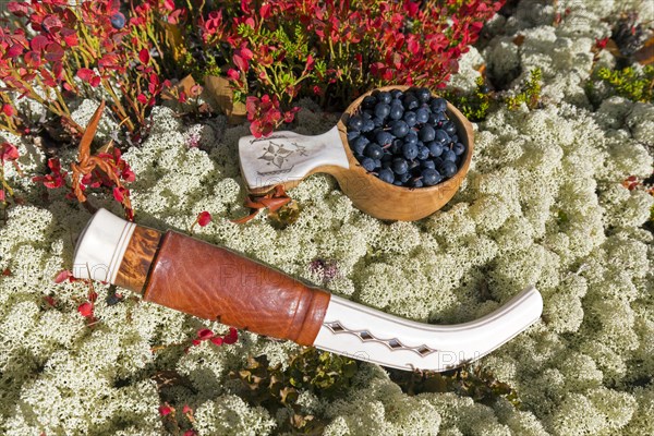 Traditional Sami knife and Scandinavian cup