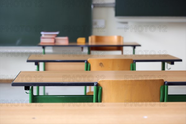 Chairs in a classroom as schools begin to prepare for a return to teaching full classes in September. Bavaria