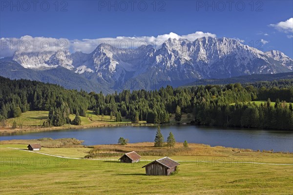 The Karwendel Mountain Range and huts along lake Gerold