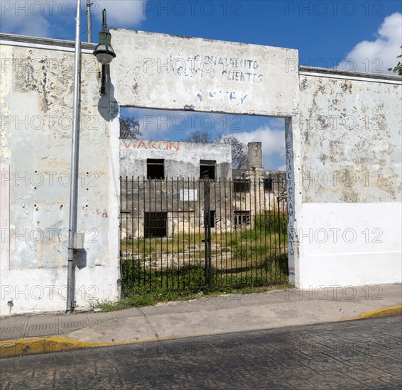 Derelict buildings closed public parking site near city centre