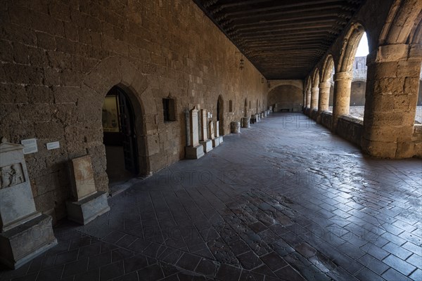 Two-storey building with a large courtyard and surrounding arcade