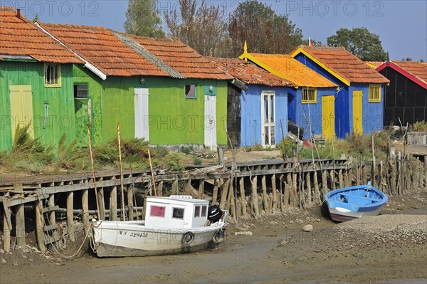 Colourful cabins of oyster farmers in the harbour at Le Chateau-d'Oleron on the island Ile d'Oleron