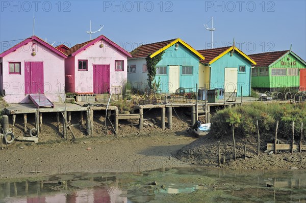 Colourful cabins of oyster farmers in the harbour at Le Chateau-d'Oleron on the island Ile d'Oleron