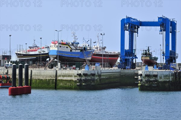 Trawler fishing boats on shipbuilding yard for maintenance works in the Guilvinec port