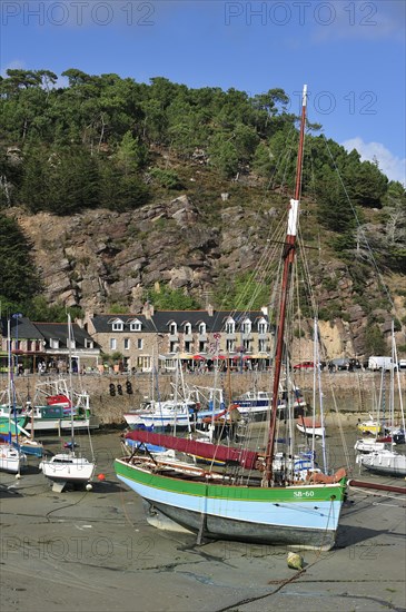 Colourful fishing boats in the harbour of Erquy