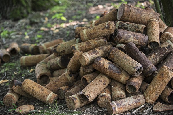 Pile of rusty First World War One artillery grenade shells