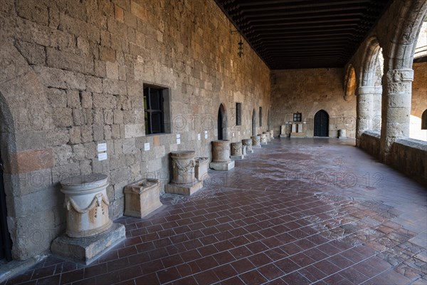 Two-storey building with a large courtyard and surrounding arcade