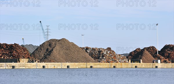 Scrap heap along the Ghent-Terneuzen Canal at Ghent seaport