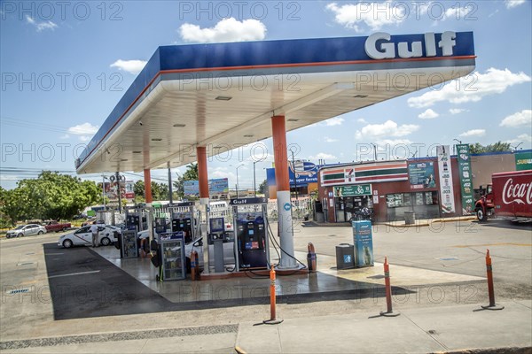 View from bus window of Gulf petrol gas service station