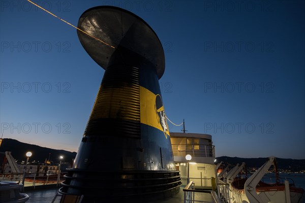 Night view over one of the many ferries connecting the mainland with the Mediterranean island of Corsica