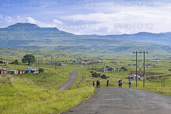 Drakensberg Mountain Range and rural settlement in the countryside of Injisuthi area in KwaZulu-Natal