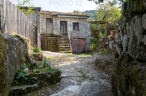 Abandoned old buildings in village of Pazos de Arenteiro
