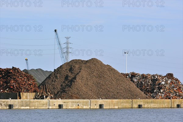 Scrap heap along the Ghent-Terneuzen Canal at Ghent seaport