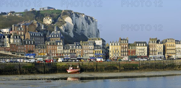 Fishing boat at low tide in the harbour at Le Treport