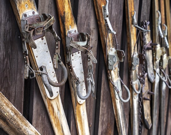 Old wooden skis with spring binding