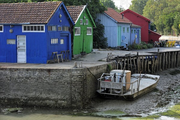 Colourful cabins of oyster farmers in the harbour at Le Chateau-d'Oleron on the island Ile d'Oleron