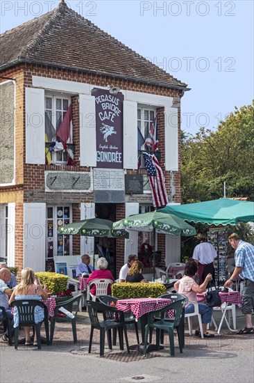 Tourists visiting the Pegasus Bridge cafe