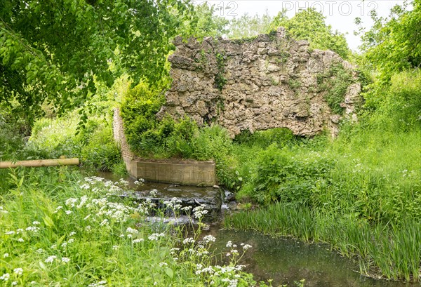 Rockworks Folly next to Byde Brook tributary stream of River Avon