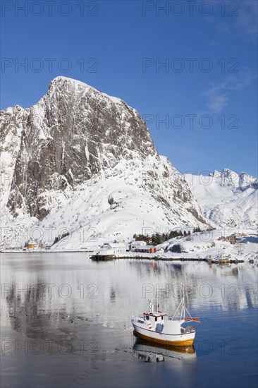 Fishing boat in the harbour Hamnoy