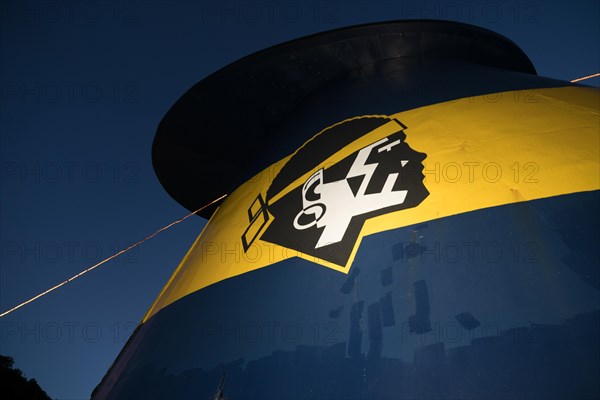 Chimney with the Corsican coat of arms of a ferry to the Mediterranean island of Corsica