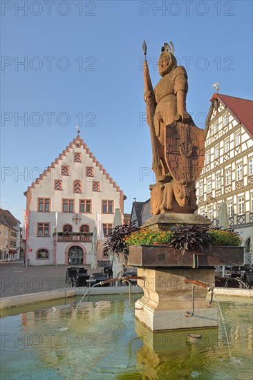 Milchling fountain with sculpture of Grand Master Wolfgang Schutzbar alias Milchling of the Teutonic Order as knight with coat of arms