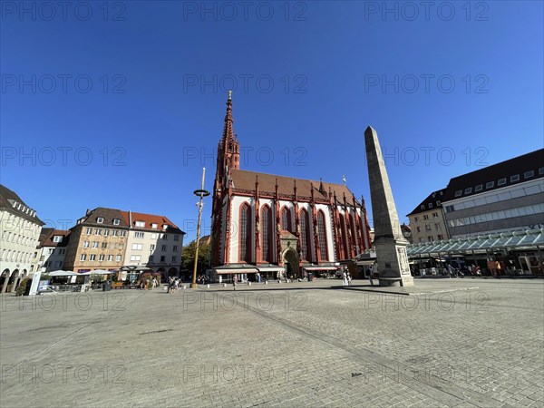 Gothic Lady Chapel on the market square with fountain obelisk