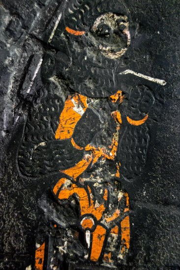 Detail of medieval epitaph on gravestone