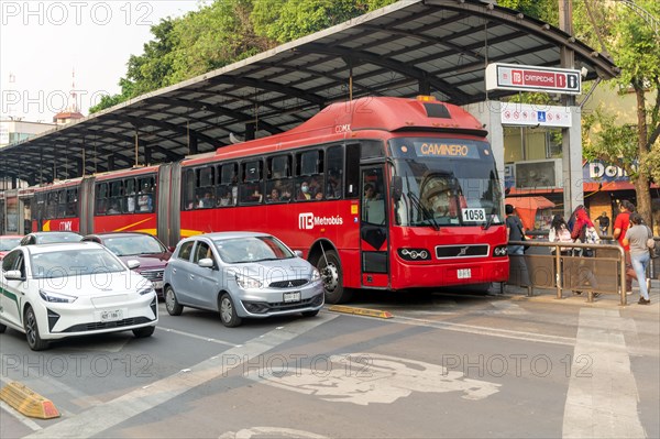 Articulated metrobus bus vehicle at Campeche station