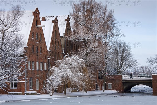 Historic salt warehouses in the snow in winter