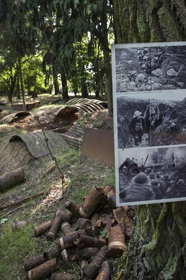 Piles of rusty shells and remains of First World War One trench at the Hooge Crater