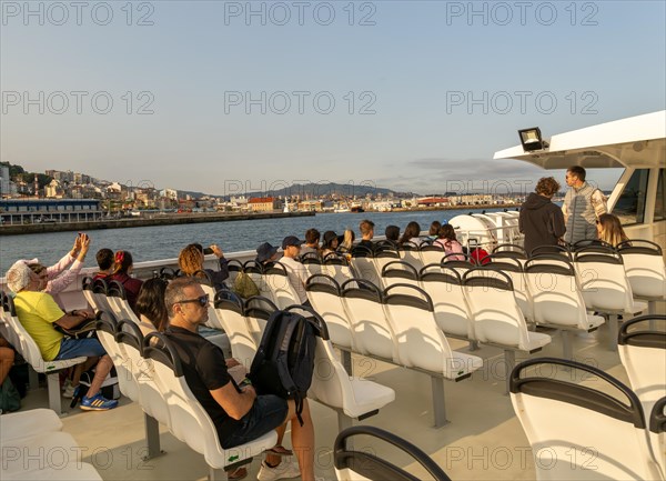 Passengers on board Mar de Ons ferry boat to the Cies Islands from city of Vigo