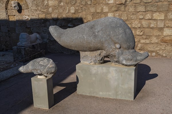 Dolphin with child as grave decoration