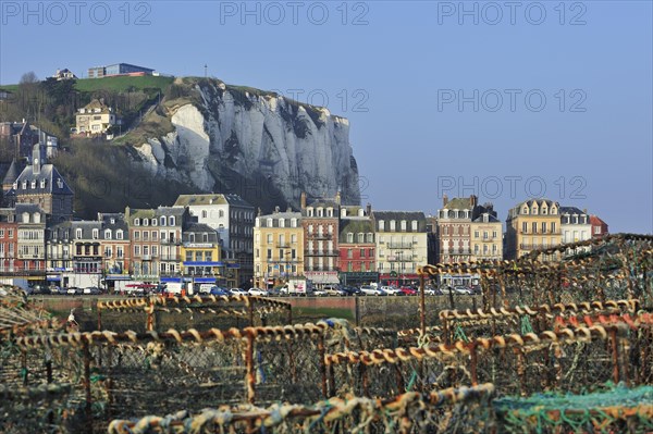 Lobster traps and view over the town Le Treport