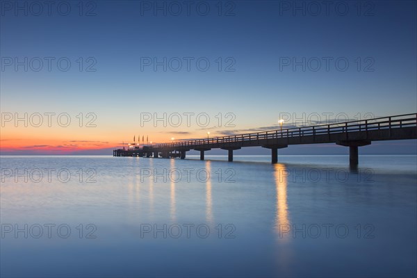 Illuminated wooden pier