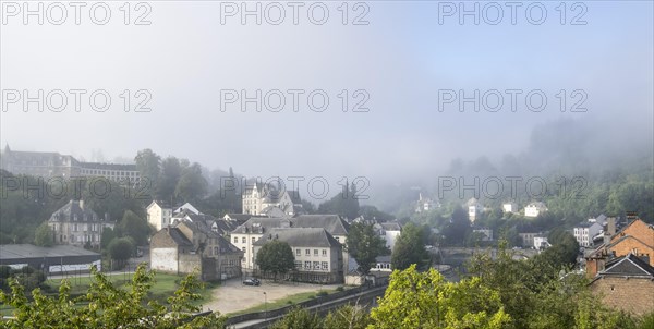 Early morning mist rising over the city Bouillon