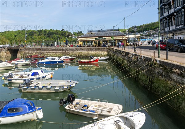 Boats moored in inner harbour view to Embankment cafe bistro