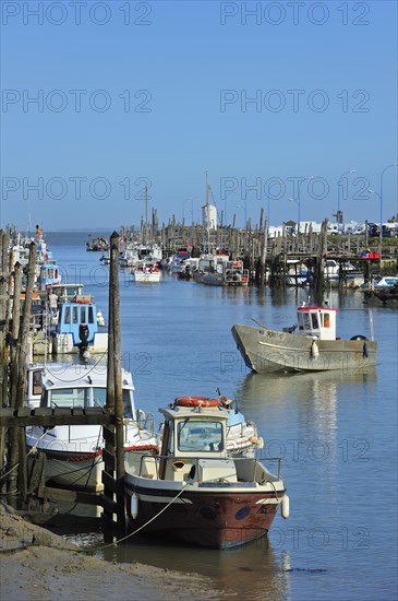 Fishing boats and oyster farming boats in the harbour Port du Bec near Beauvoir-sur-mer