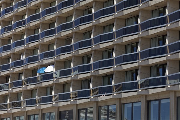 Flat house with many balconies