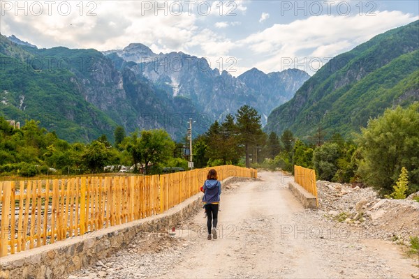 Walking along the trail in the valley of Theth national park