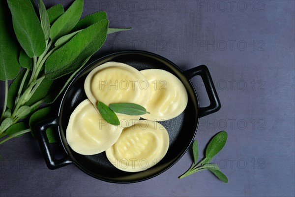 Tortellini and sage leaves