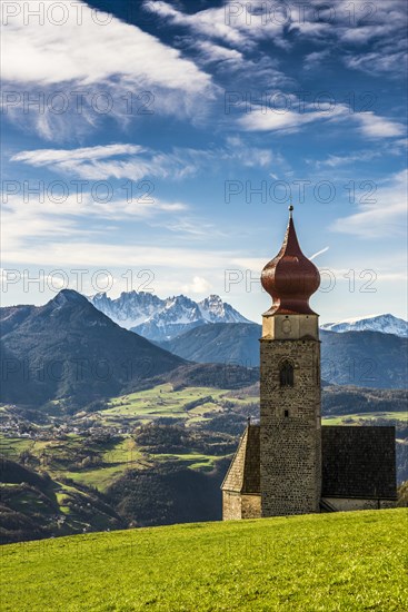 Snow-covered mountains and church