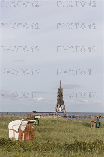 Beach chairs in front of the Kugelbake